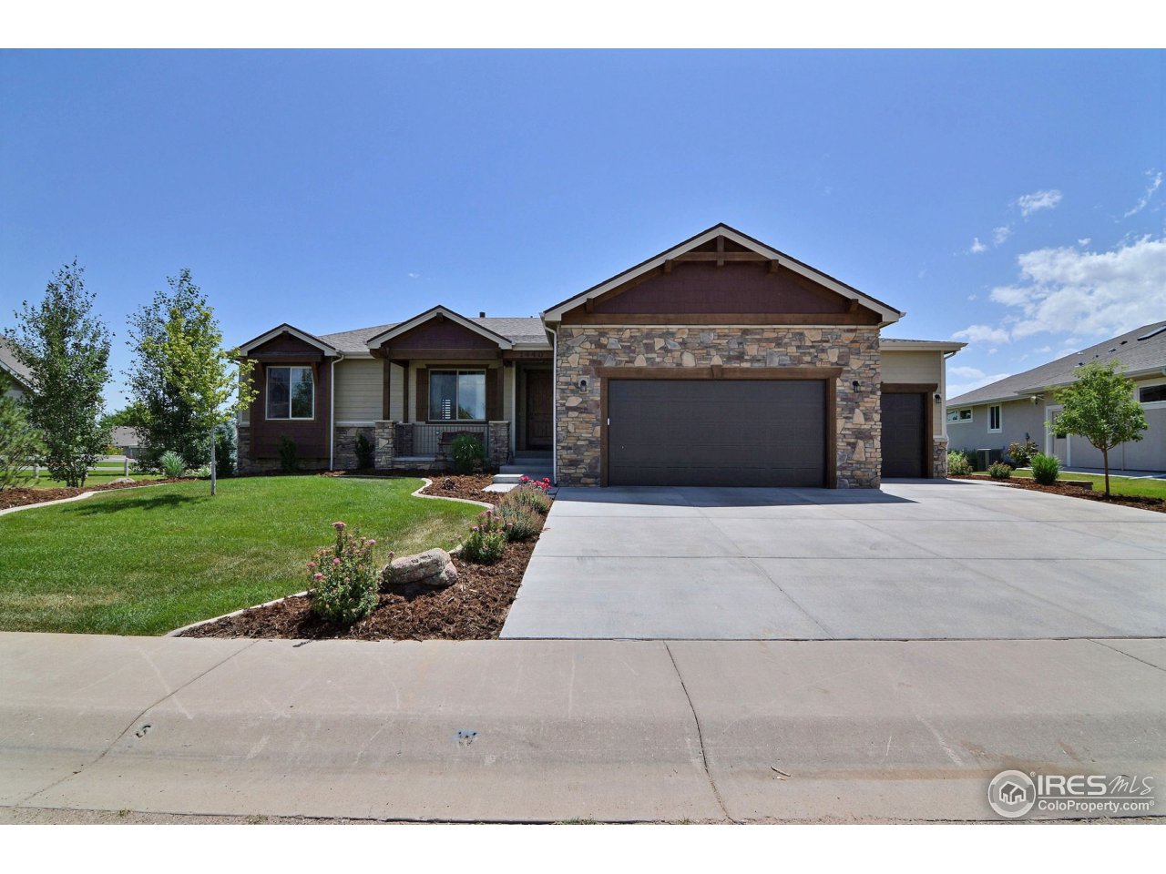 1440 Red Tail Road Eaton, CO 80615 - Photo 37 of 40 Oversize 4-Car Garage with Epoxy Floors