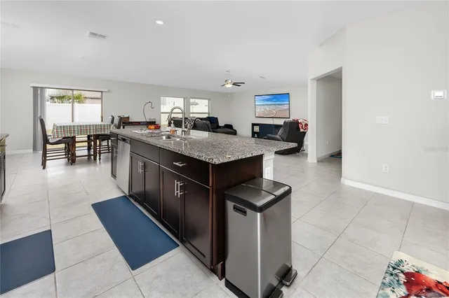 a kitchen with counter top space and appliances