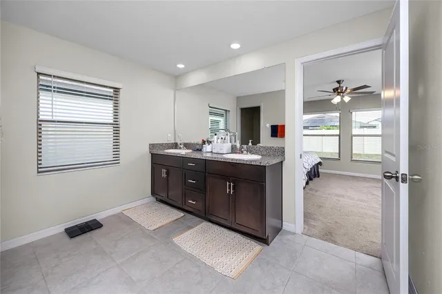 a room with a dresser and a window