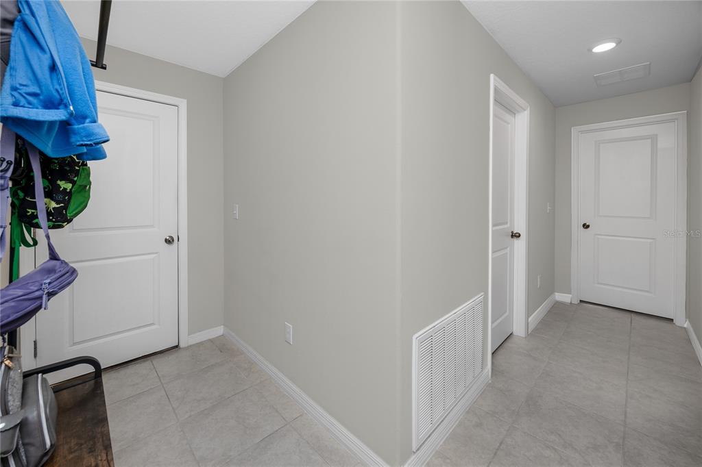 16654 Carlton Pond Street Wimauma, FL 33598 - Photo 34 of 48 a view of a hallway with closet