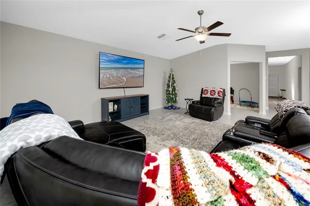 a bedroom with a bed and dresser