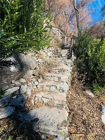 a view of swimming pool with wooden floor