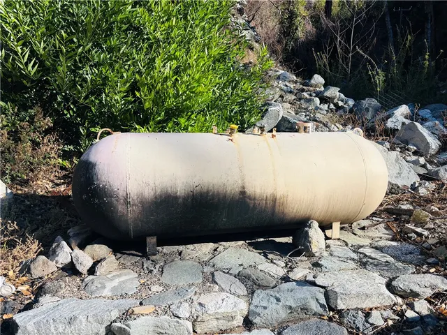 a view of swimming pool with lawn chairs yard