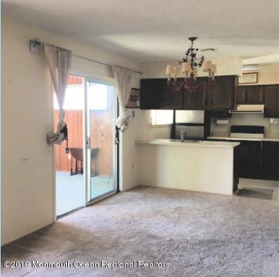 767 B Marlton Road, Unit 767B Monroe Township, NJ 08831 - Photo 6 of 17 Dining overlooking Sun Rm