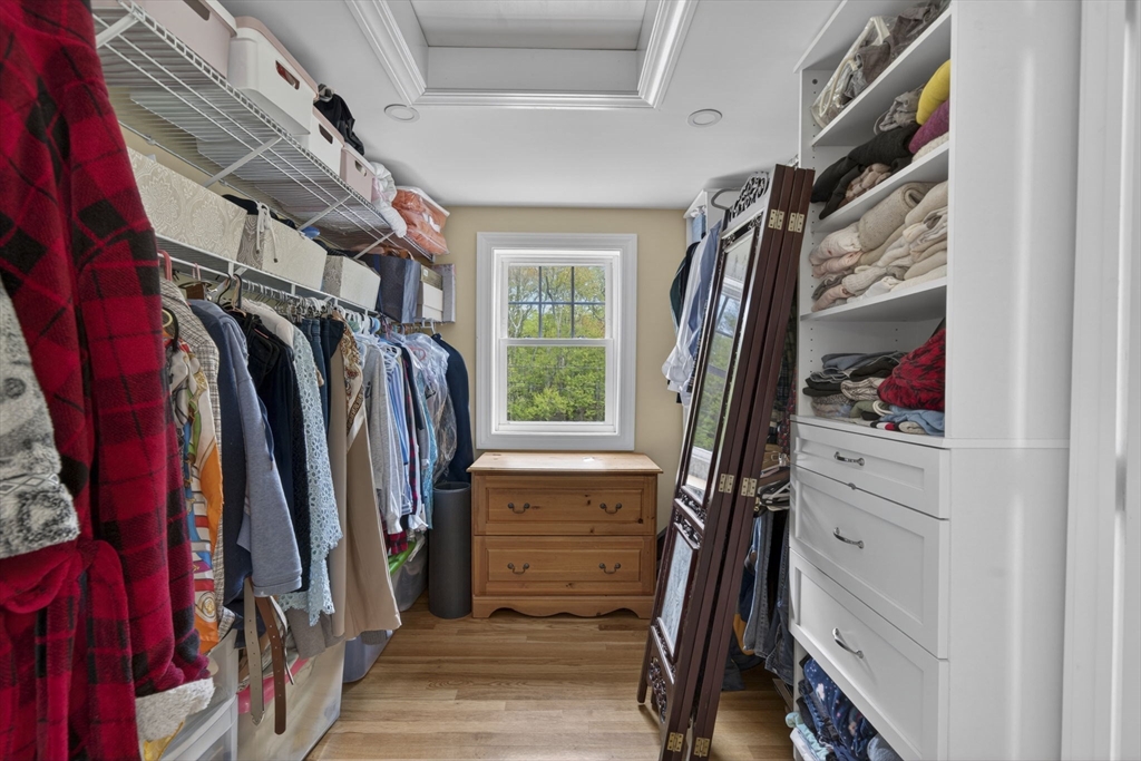 229 Parkerville Road Southborough, MA 01772 - Photo 23 of 38 a view of walk in closet with clothes and shoes