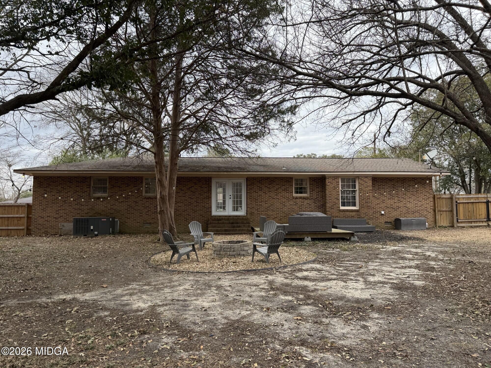 229 Southwest Peter Street Cochran, GA 31014 - Photo 22 of 24 a view of a car park in front of a house
