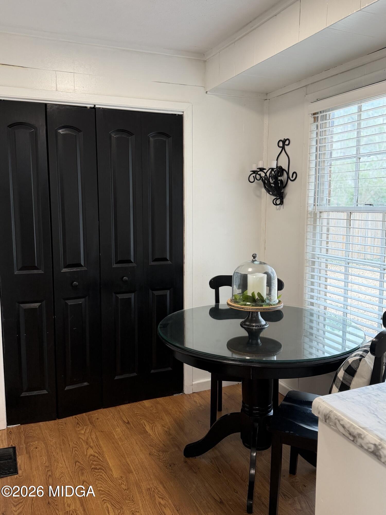 229 Southwest Peter Street Cochran, GA 31014 - Photo 10 of 24 a view of a workspace room with furniture and window