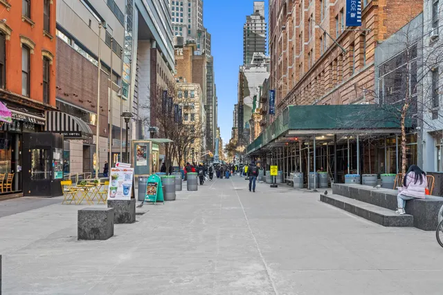 a view of path with retail shops