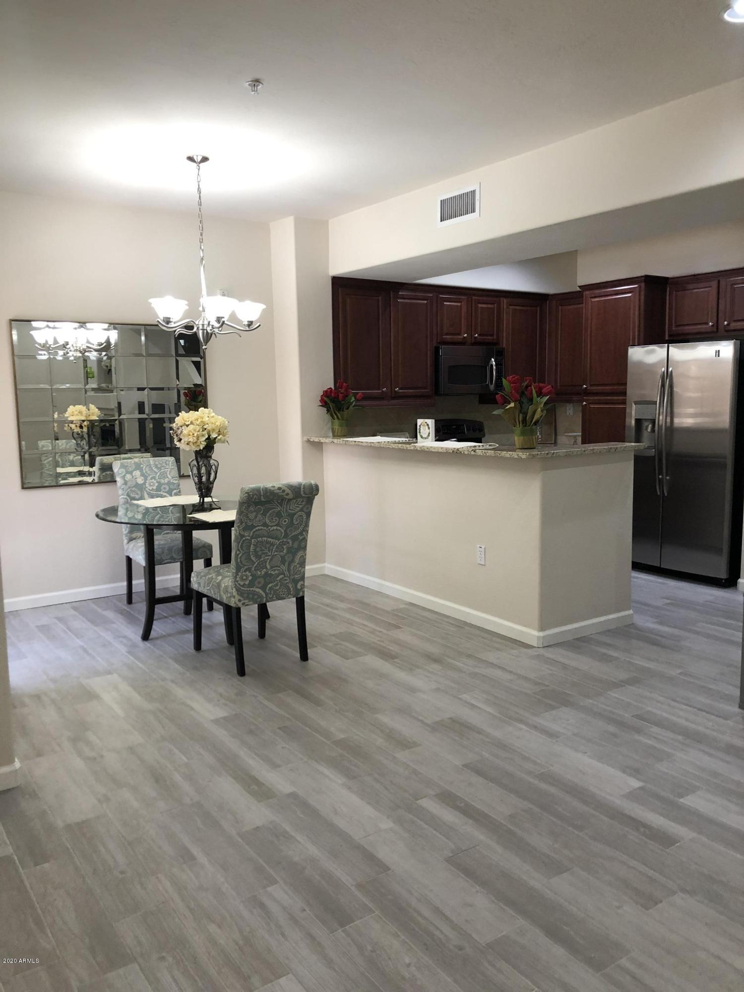 3935 East Rough Rider Road, Unit 1079 Phoenix, AZ 85050 - Photo 8 of 59 Dining area