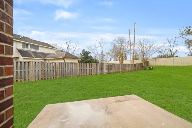 a view of a backyard with a garden