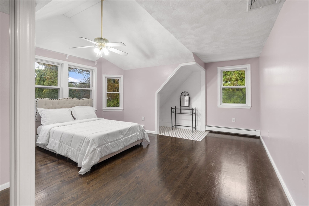 8 McDonald Road Wilmington, MA 01887 - Photo 16 of 40 a spacious bedroom with a large bed and a window