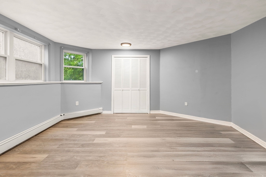8 McDonald Road Wilmington, MA 01887 - Photo 26 of 40 a view of an empty room with a window