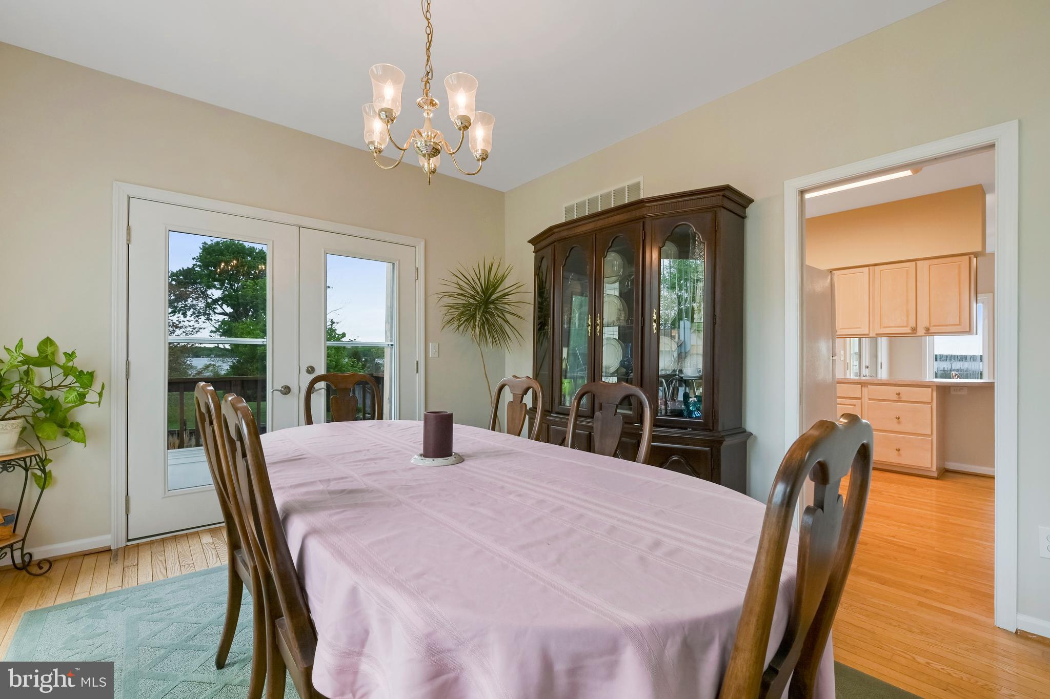 1100 Paca Drive Edgewater, MD 21037 - Photo 41 of 60 Dining Room w/ door to outside deck