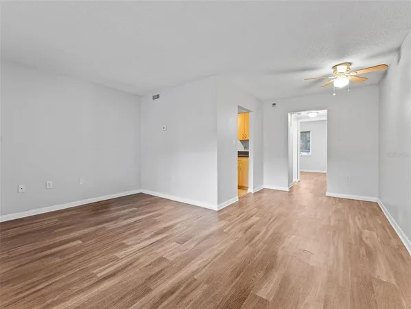 a view of a car parked in front of a building