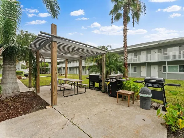 an aerial view of a building with outdoor space
