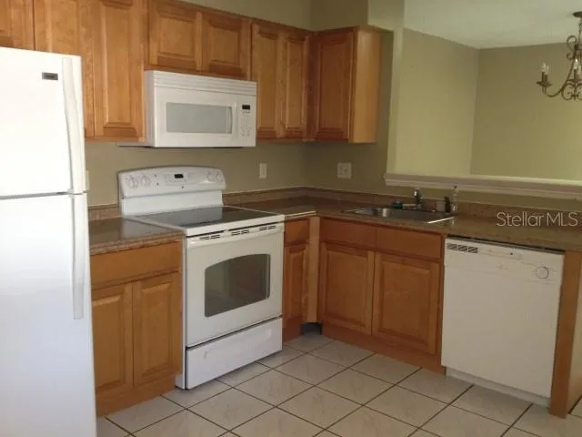 a view of a small space with wooden floor