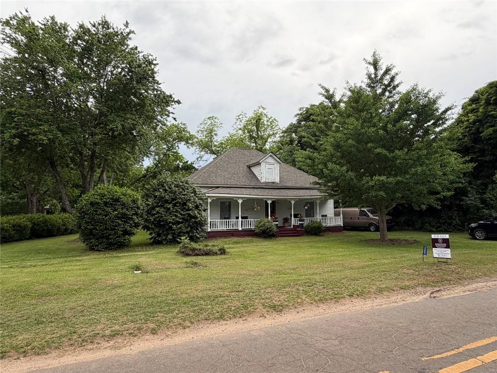 209 Old Perry Road Marshallville, GA 31057 - Photo 29 of 40 a view of a house with a yard