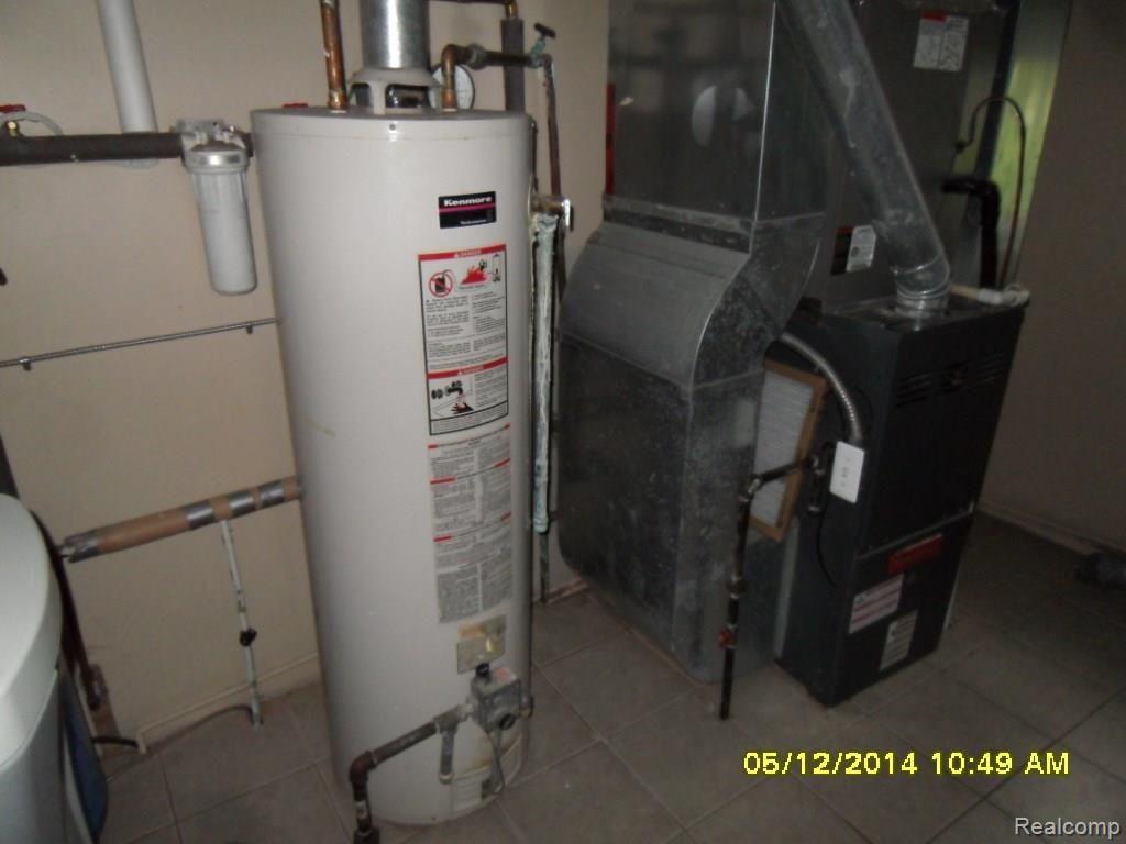 1341 Riley Center Road Memphis, MI 48041 - Photo 17 of 31 furnace and h2o.jpg