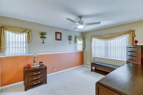 a room with furniture and window