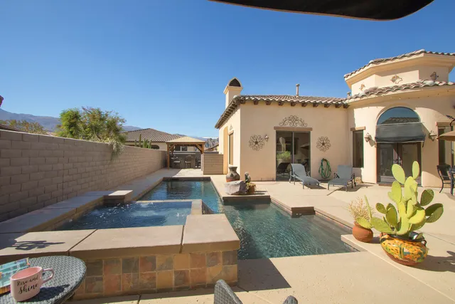 a view of a house with entertaining space