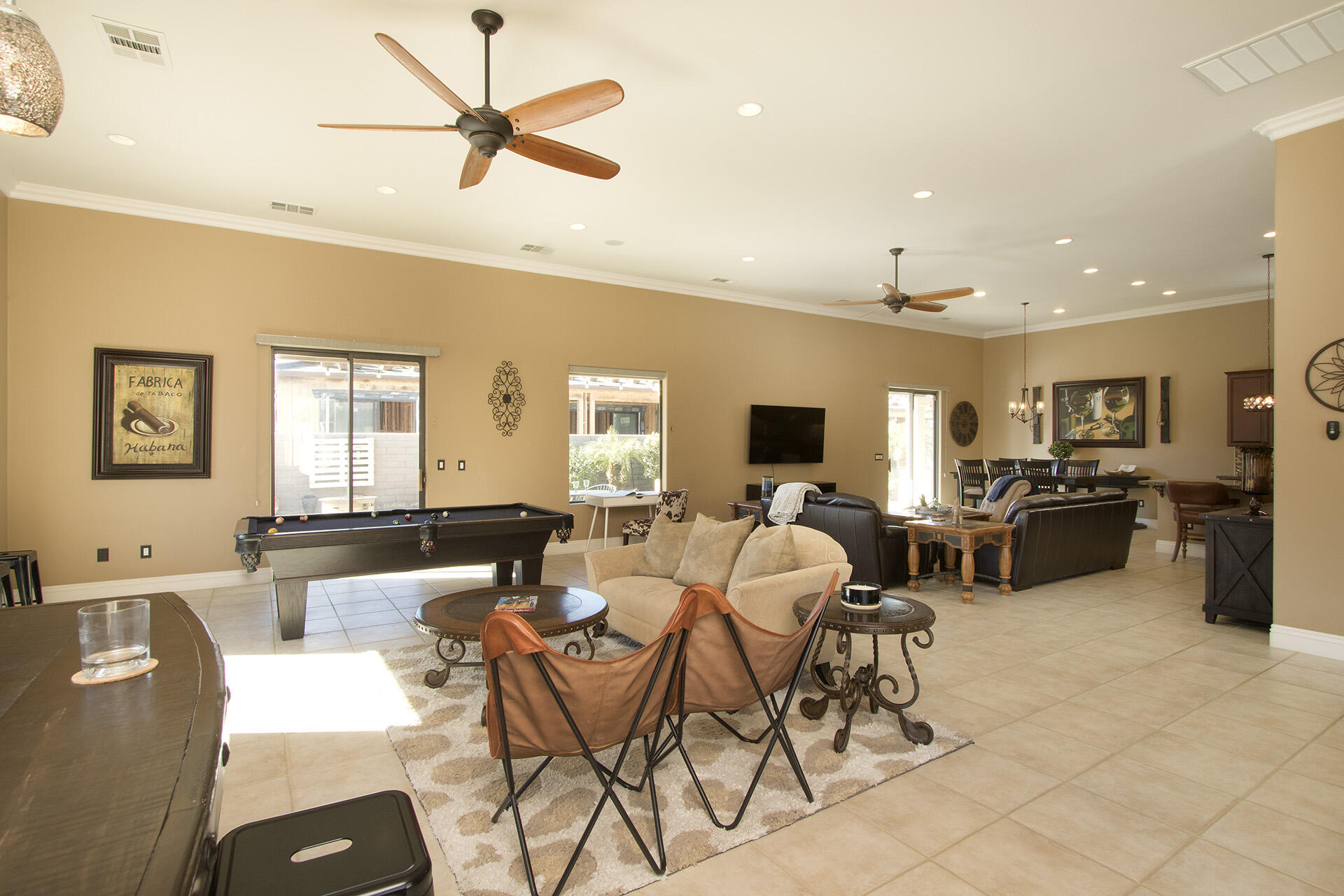 57669 Santa Rosa Trail La Quinta, CA 92253 - Photo 23 of 59 a living room with furniture kitchen view and a large window