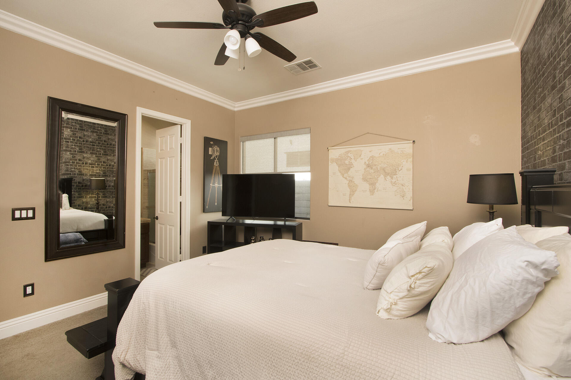 57669 Santa Rosa Trail La Quinta, CA 92253 - Photo 42 of 59 a bedroom with a bed and a flat screen tv