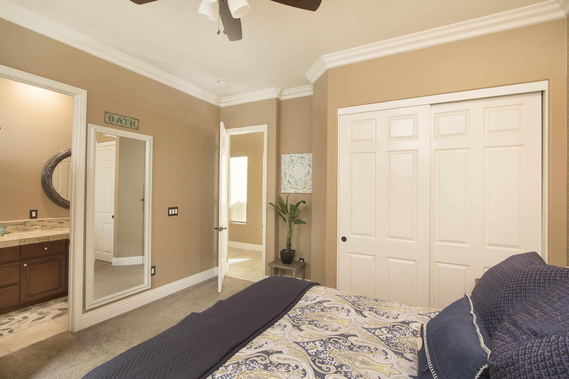 57669 Santa Rosa Trail La Quinta, CA 92253 - Photo 46 of 59 a bedroom with a bed and a dresser