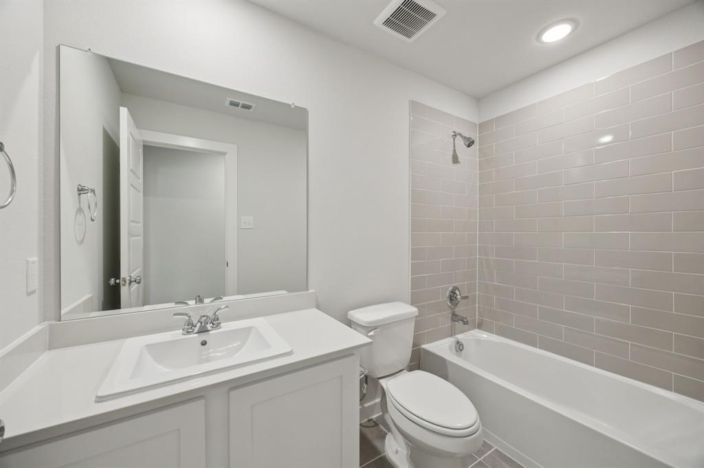 853 Rockcloud Drive Haslet, TX 76052 - Photo 17 of 27 Bathroom in the Hadley home plan by Trophy Signature Homes – REPRESENTATIVE PHOTO