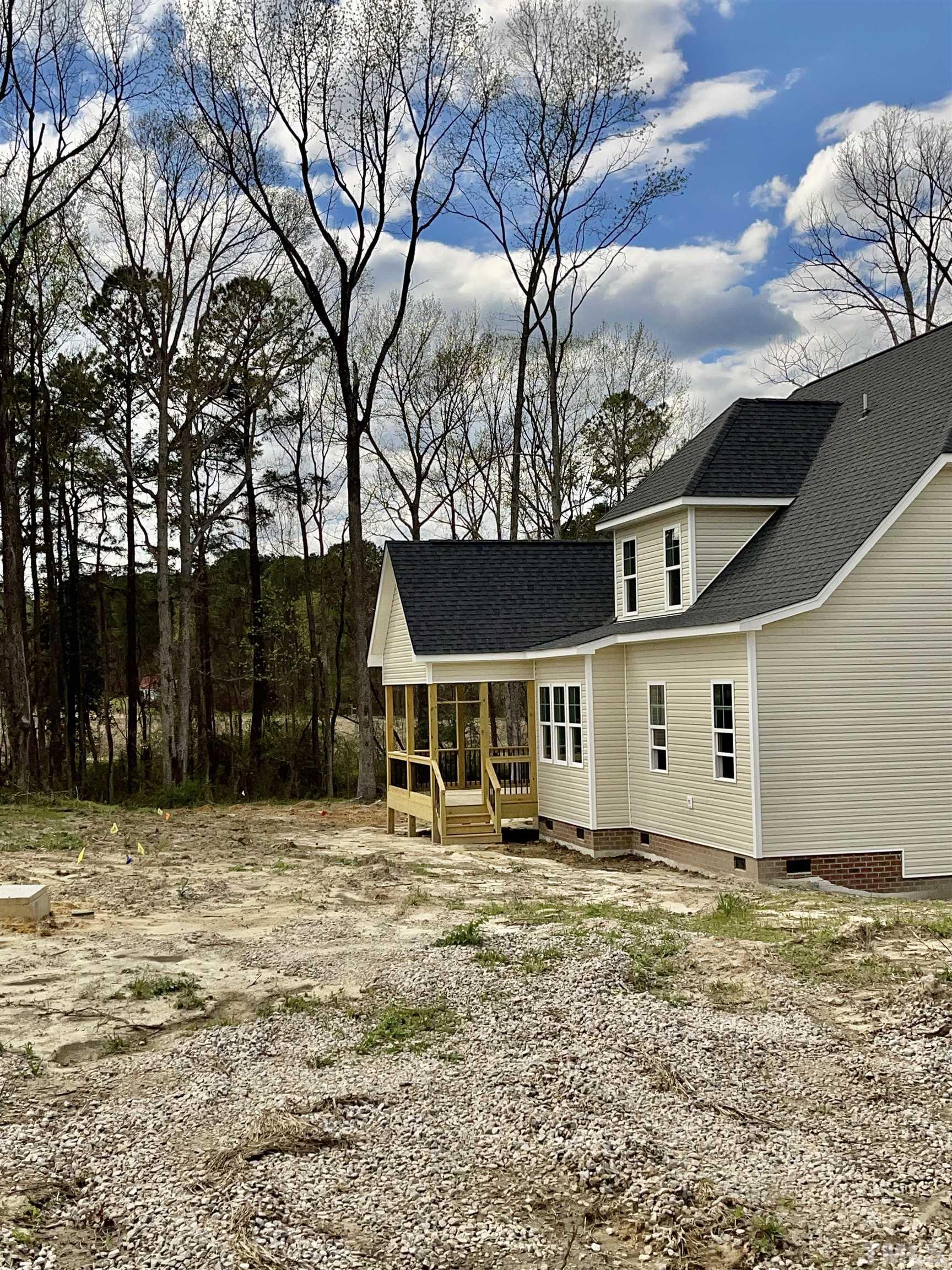 5341 Roseheath Road Bailey, NC 27807 - Photo 5 of 12 a front view of a house with a yard