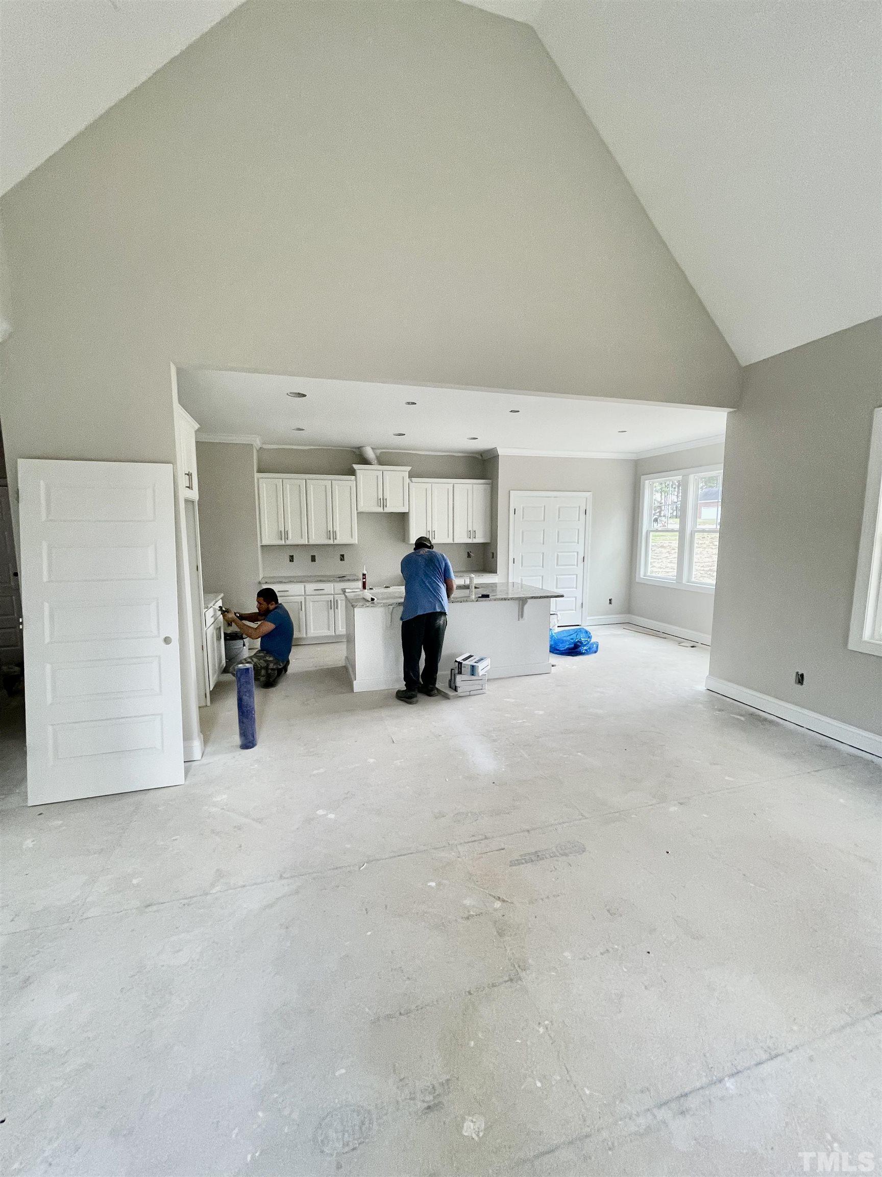 5341 Roseheath Road Bailey, NC 27807 - Photo 8 of 12 a living room with furniture and a large window