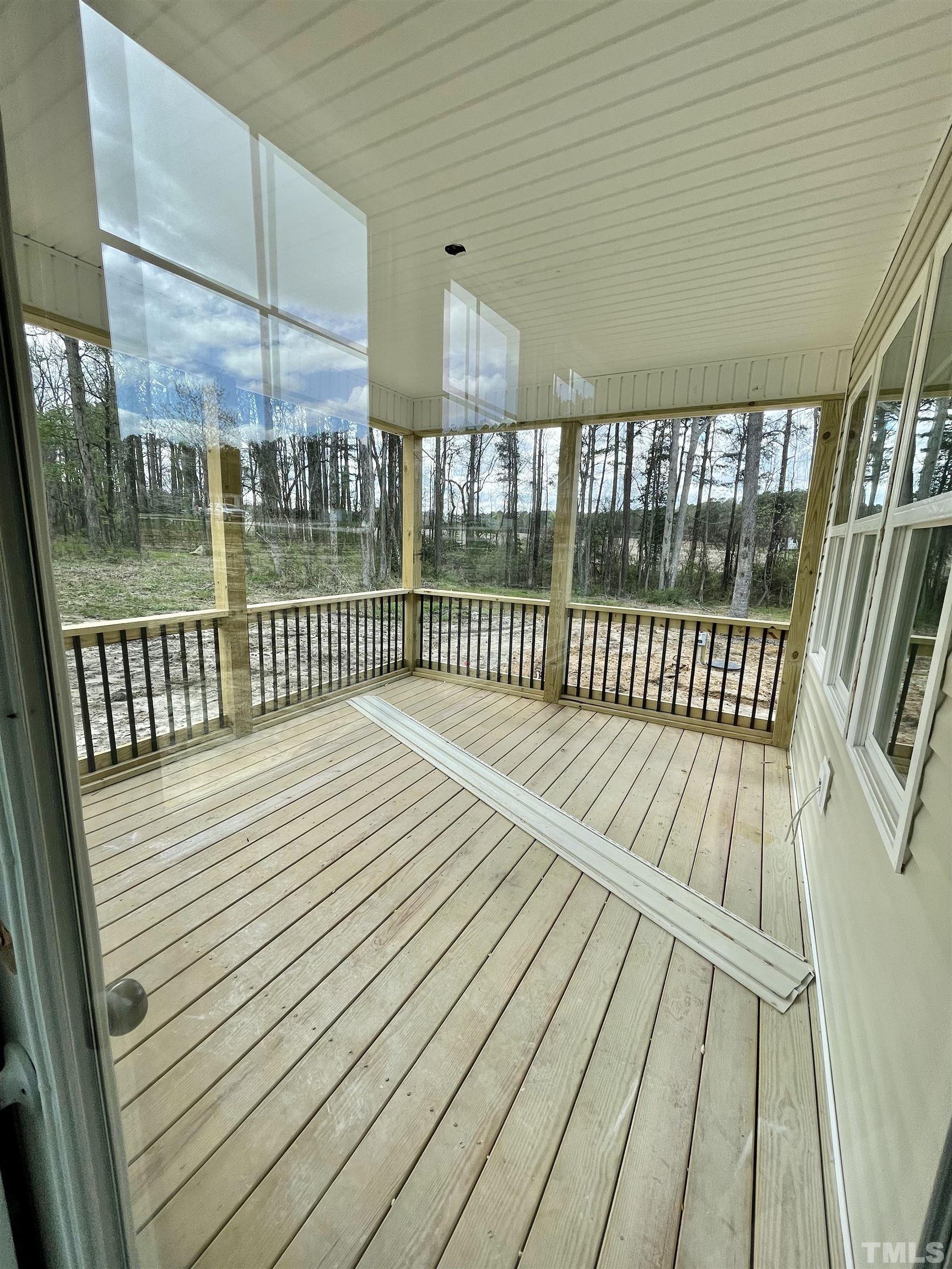 5341 Roseheath Road Bailey, NC 27807 - Photo 10 of 12 a view of balcony with wooden floor