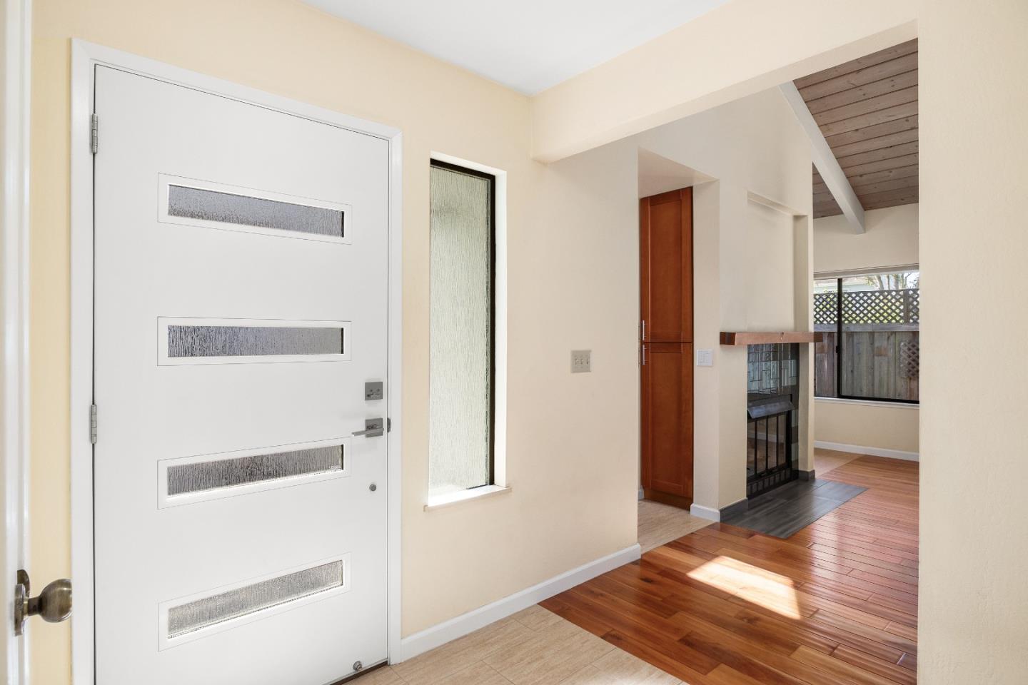 710 Freeman Court Santa Cruz, CA 95062 - Photo 2 of 18 a view of a hallway with bathroom and wooden floor