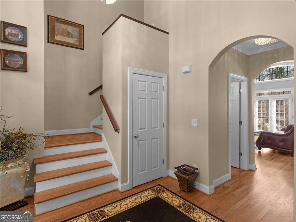 355 Parker Road Covington, GA 30014 - Photo 12 of 60 a view of a hallway with wooden floor and workspace