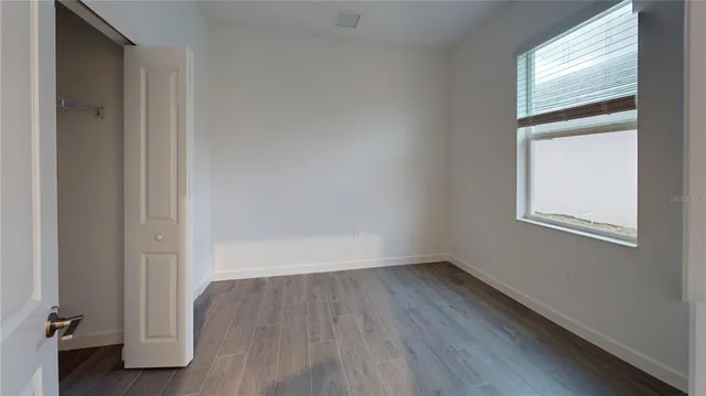 a view of a swimming pool with an outdoor seating