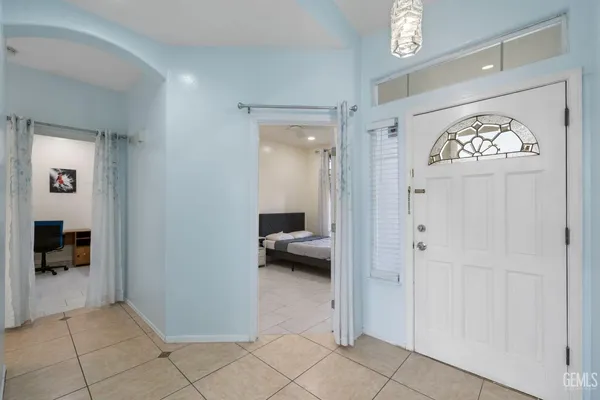 a view of an entryway and livingroom