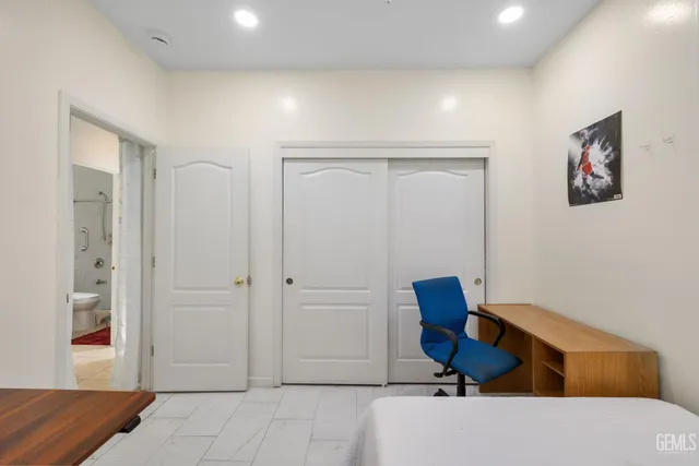 a workspace with furniture and a window