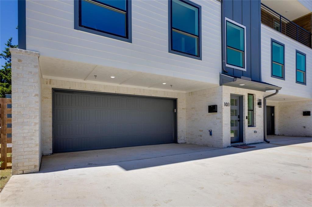 2011 Kirby Street, Unit 106 Dallas, TX 75204 - Photo 2 of 32 View of front facade with a garage