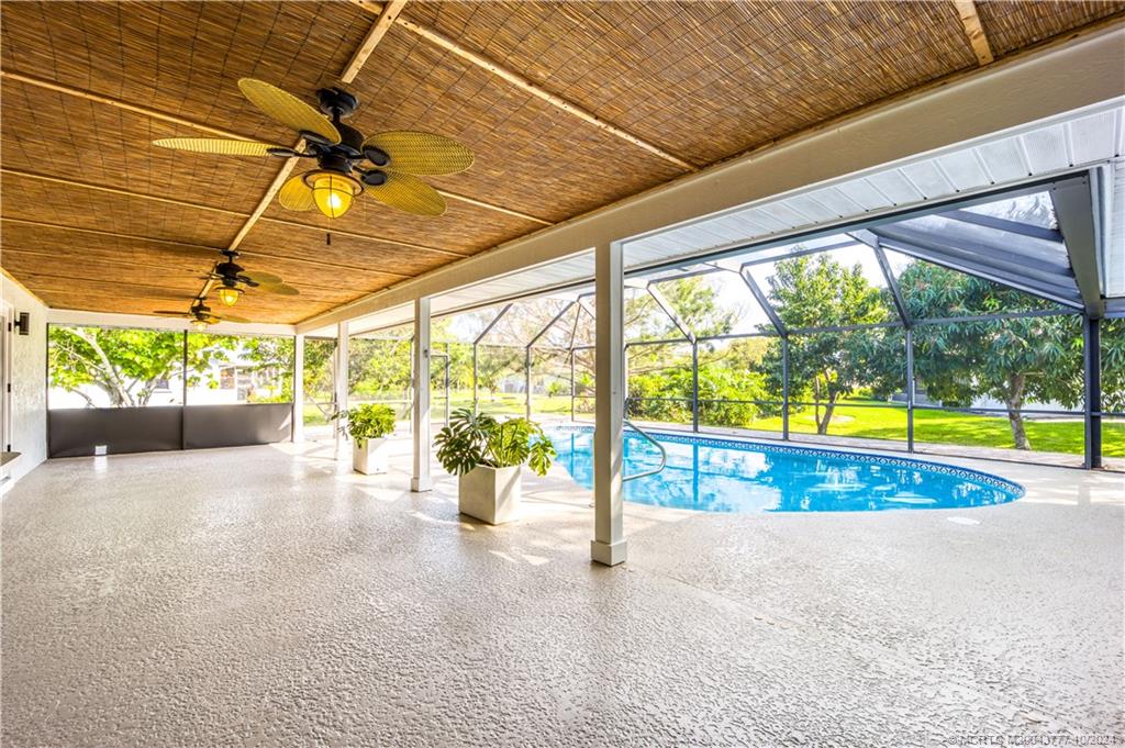 2556 Captiva Cove Stuart, FL 34994 - Photo 61 of 68 a view of a swimming pool with a patio