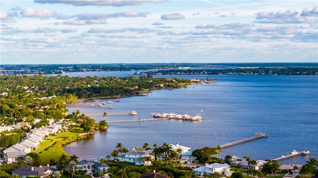 2556 Captiva Cove Stuart, FL 34994 - Photo 68 of 68 an aerial view of a house with a lake view