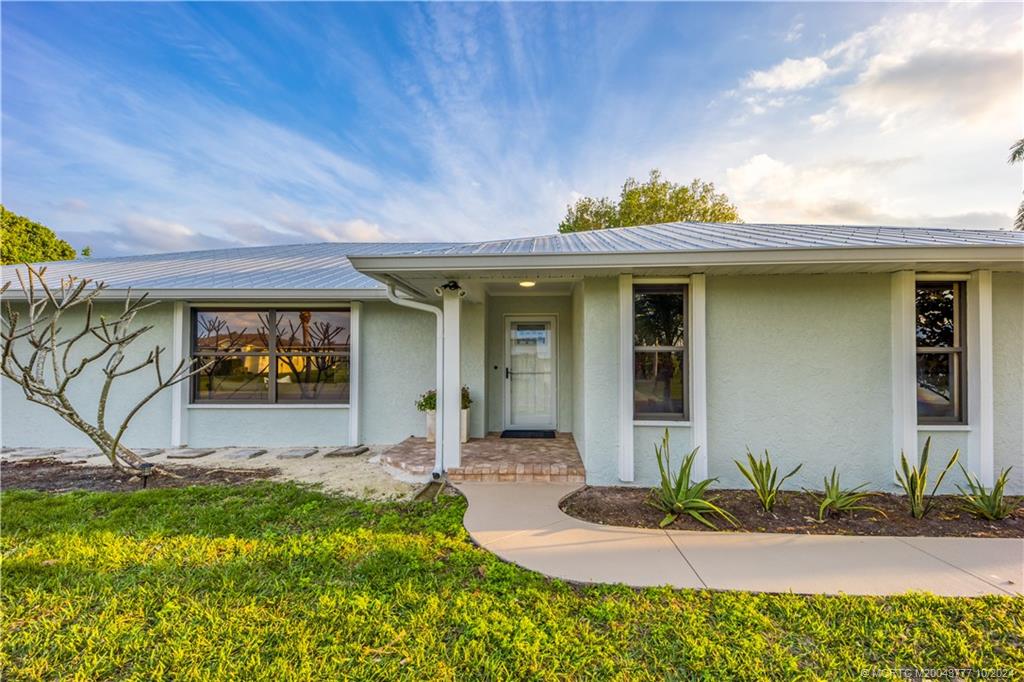 2556 Captiva Cove Stuart, FL 34994 - Photo 8 of 68 Freshly painted with SW Sea Salt and white trim. G