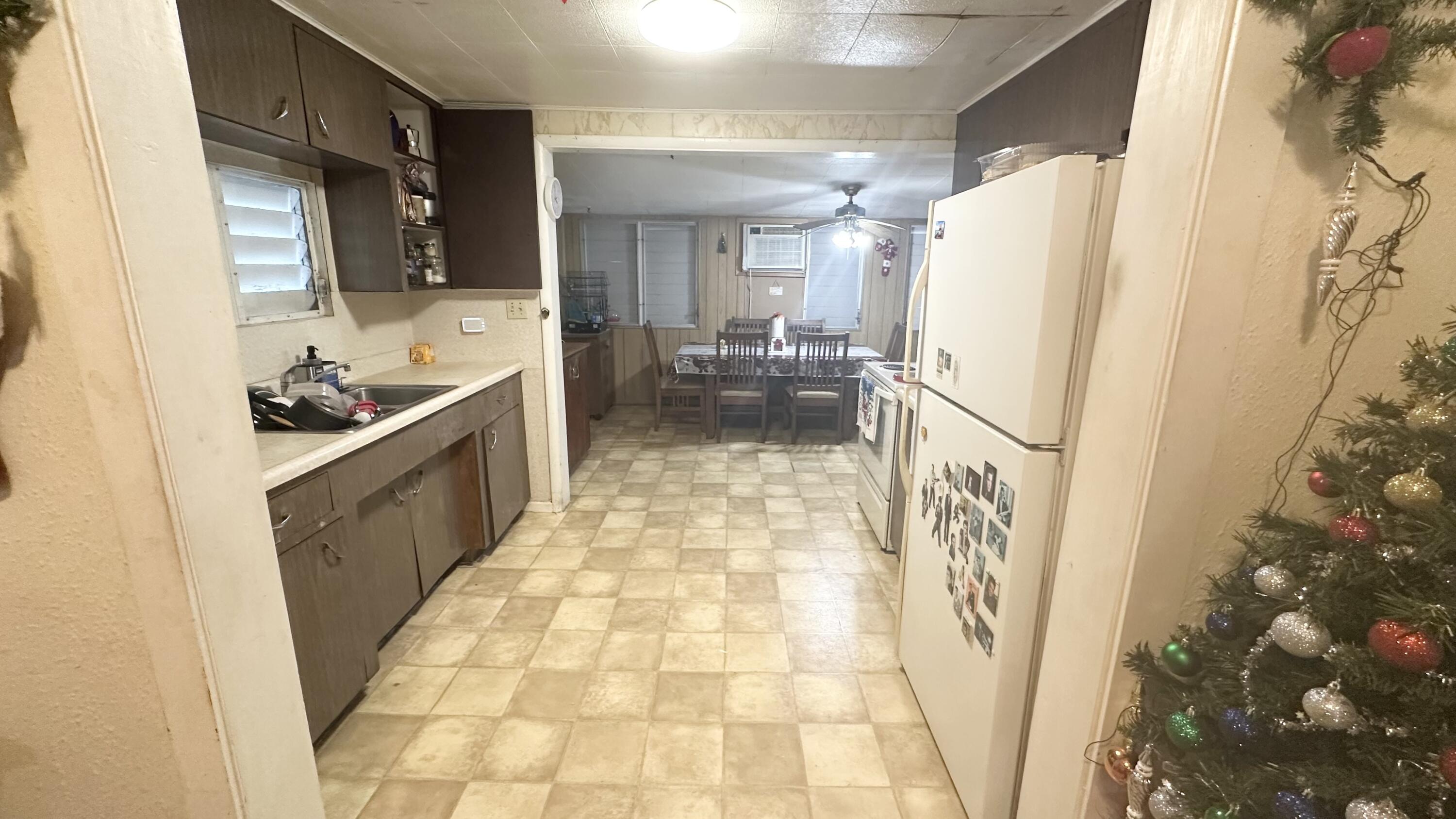 1105 Watson Street Key West, FL 33040 - Photo 4 of 26 a bathroom with a sink a mirror and a shower