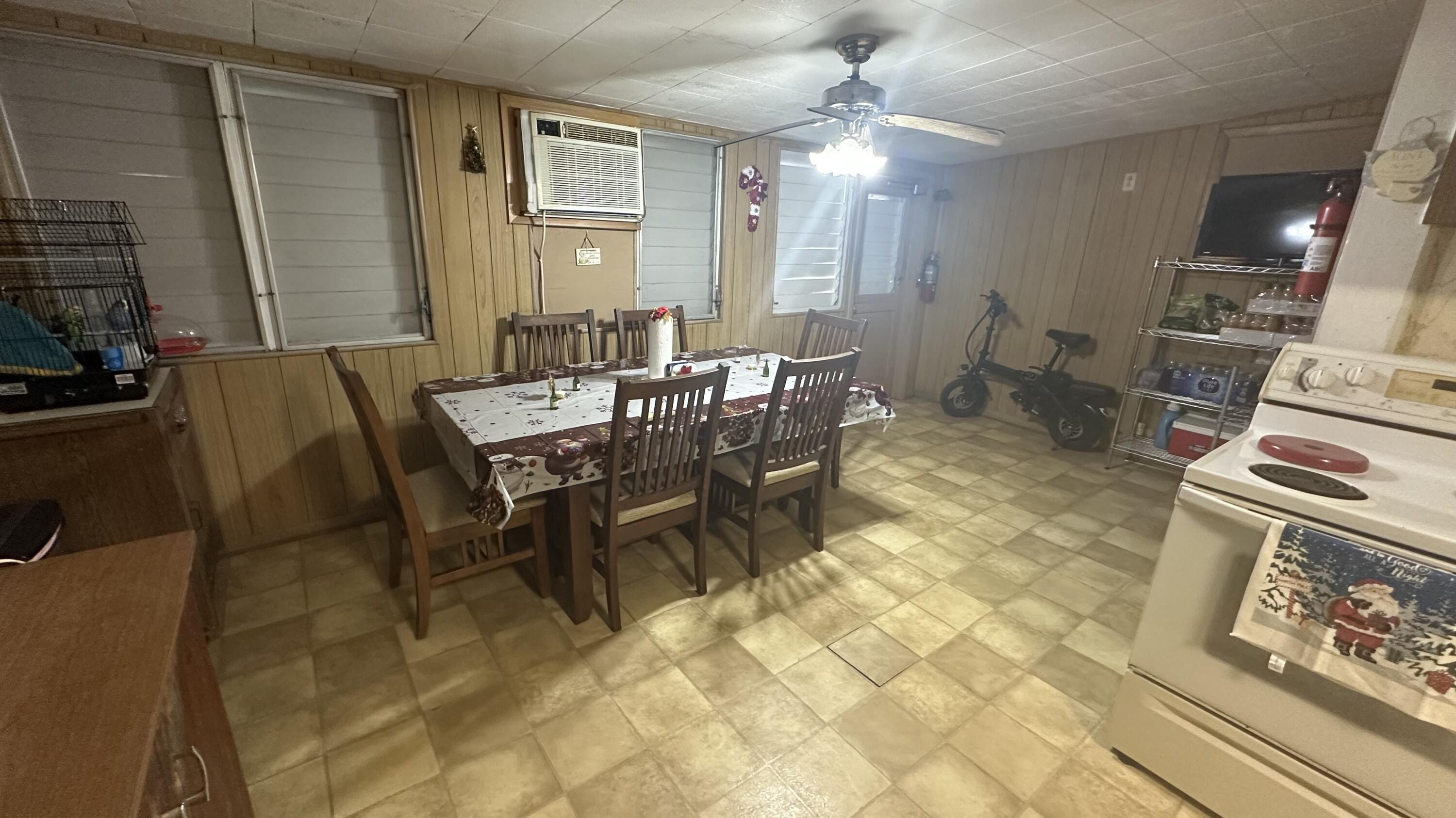 1105 Watson Street Key West, FL 33040 - Photo 8 of 26 a view of a dining room with furniture