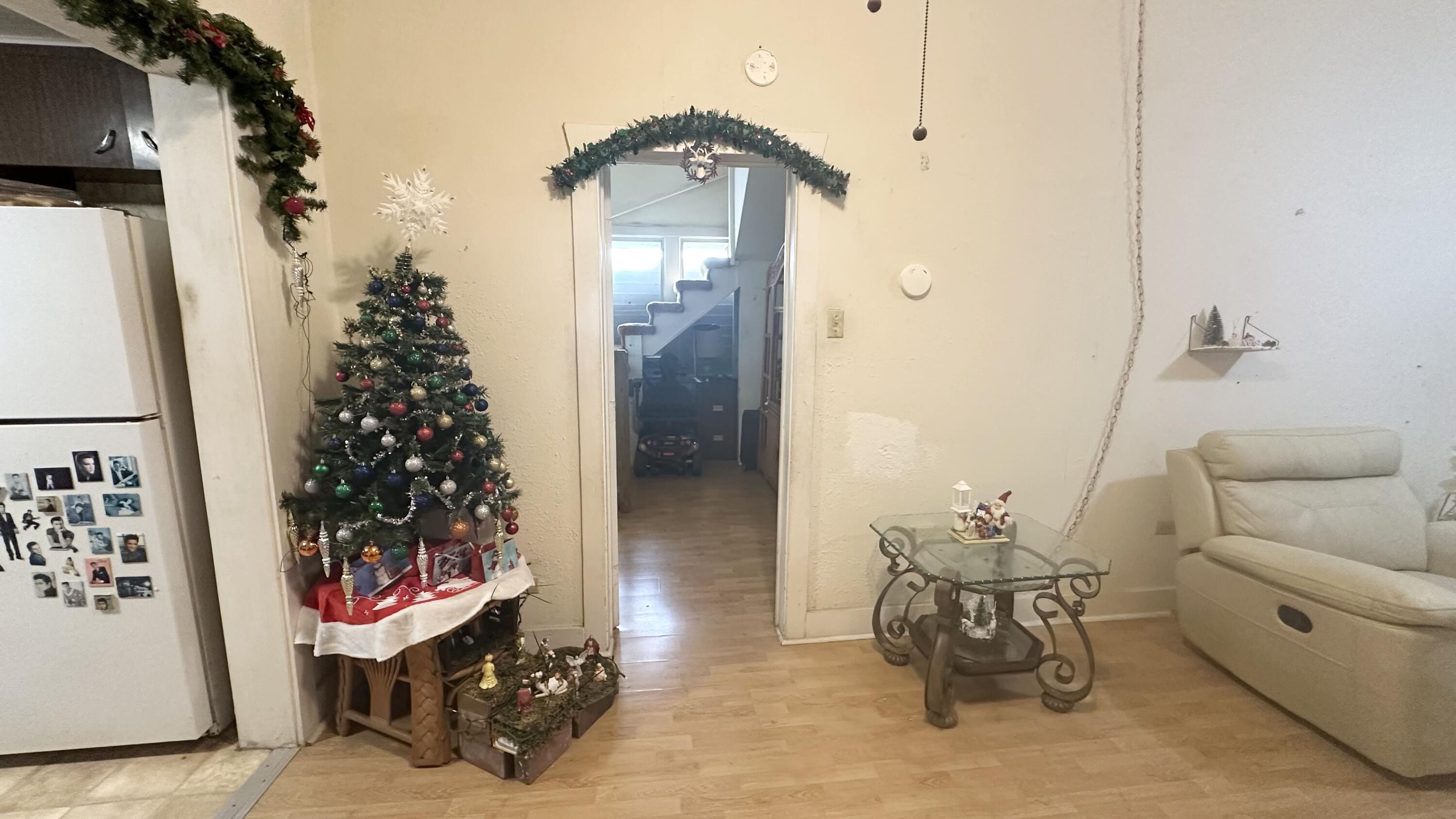 1105 Watson Street Key West, FL 33040 - Photo 10 of 26 a living room with furniture and a potted plant
