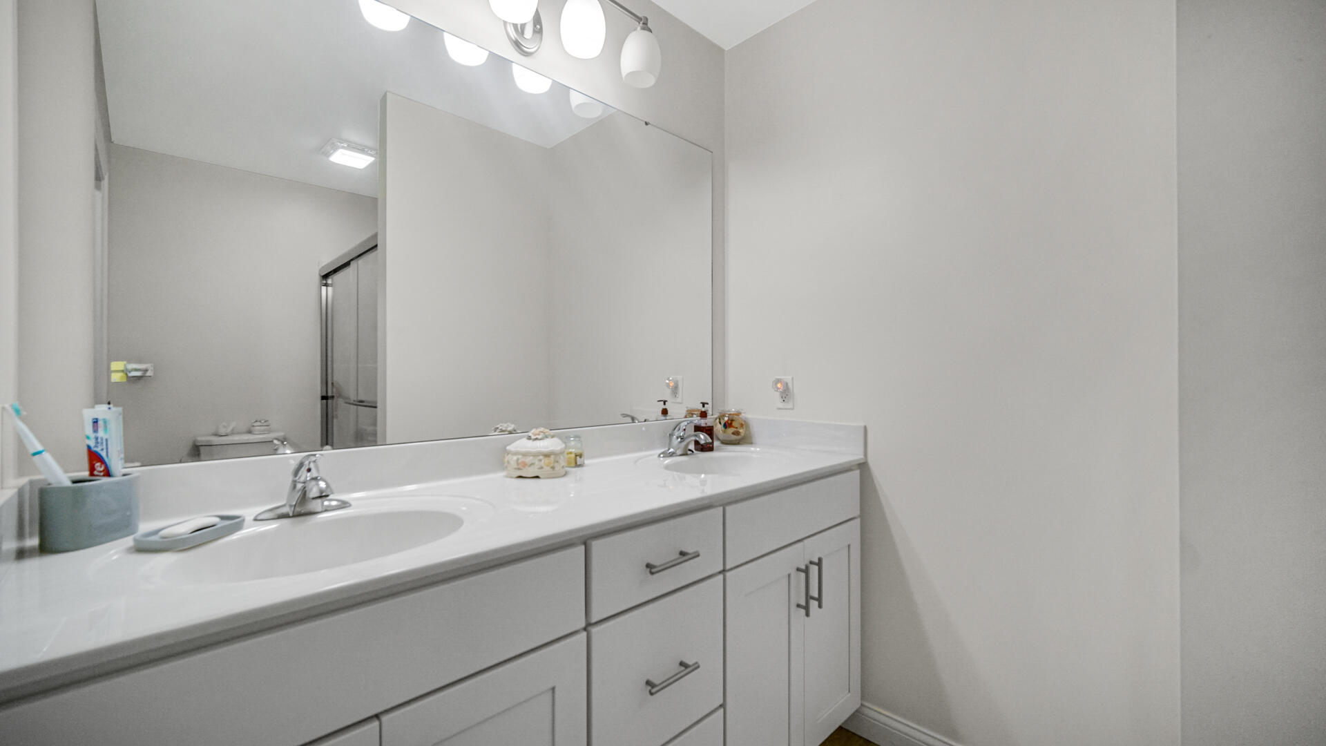 371 South Boo Road Chesterton, IN 46304 - Photo 18 of 24 a bathroom with a sink and a mirror