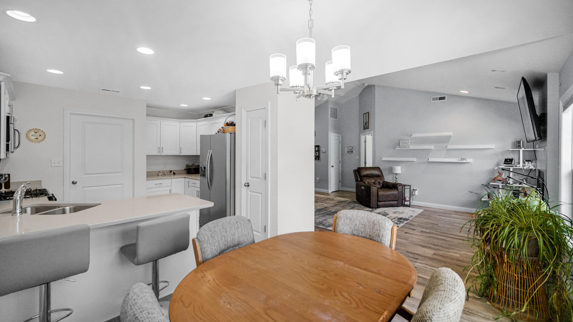 371 South Boo Road Chesterton, IN 46304 - Photo 7 of 24 a large kitchen with a table and chairs