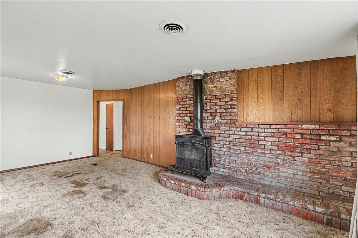 2679 Lobo Avenue Merced, CA 95348 - Photo 18 of 88 a view of an empty room with a fireplace