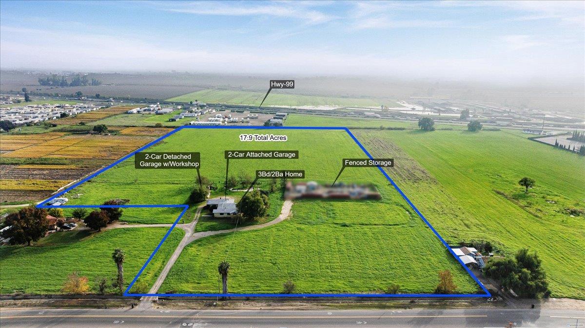 2679 Lobo Avenue Merced, CA 95348 - Photo 3 of 88 an aerial view of a tennis ground and a cars park side of the road