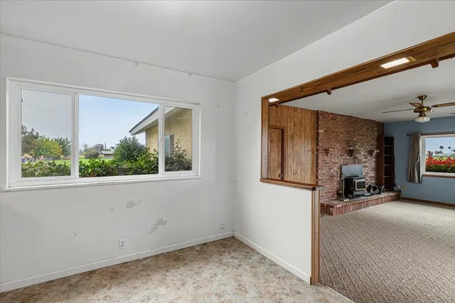 a view of a backyard of the house