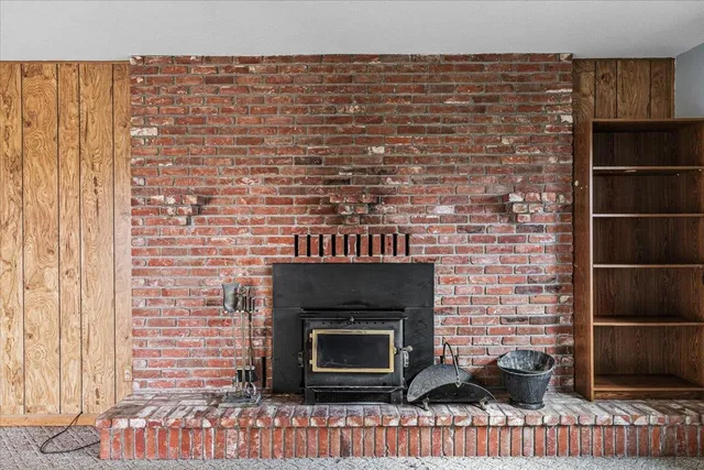 a view of a door with wooden walls
