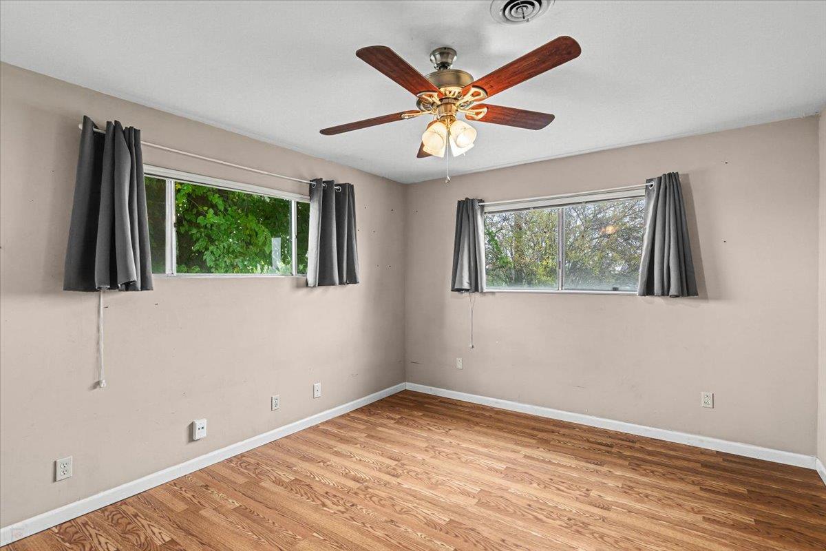 2679 Lobo Avenue Merced, CA 95348 - Photo 54 of 88 a view of a livingroom with a ceiling fan and a window